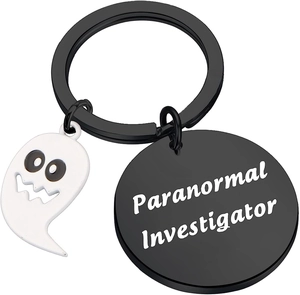 Detail of ghost charm and Paranormal Investigator engraved tag on black keychain