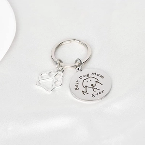 Stainless steel keychain with dog paw charm and Best Dog Mom Ever engraving on silk