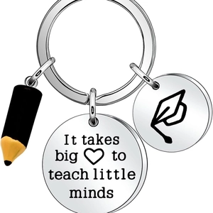 Teacher gift keychain with pencil charm and It Takes Big Heart to Teach Little Minds slogan