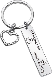 Close-up of heart charm and engraved ghost hunting text on stainless steel keychain