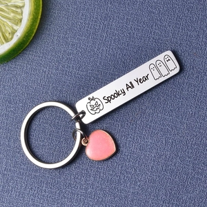 Porte-clés Spooky All Year en acier avec motif citrouille fantôme et breloque cœur rose