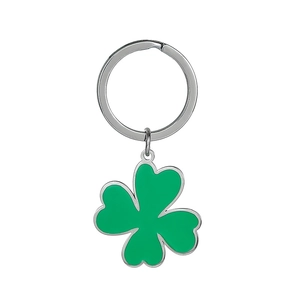 Detailed close-up of a green four-leaf clover keychain with a polished silver metal ring