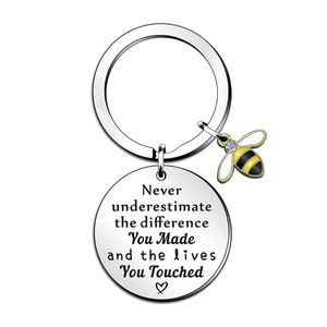 Polished stainless steel bee keychain with crystal and inspirational quote pendant
