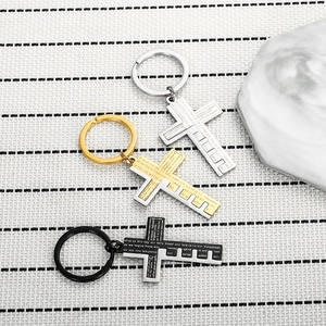 Retro cross keychains with Lord's Prayer engraving in silver, gold, and black colors