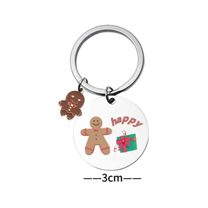 Porte-clés bonhomme de pain d'épices en inox avec médaillon gravé happy de 3cm de large
