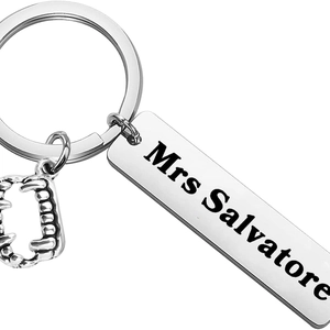 Polished stainless steel keychain with Mrs Salvatore plate and vampire fang charm