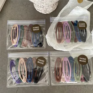 7-piece set of matte geometric oval hair clips in assorted Morandi colors for women