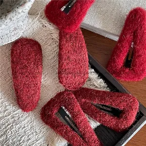 Red plush teardrop and triangle hair clips set with soft fuzzy texture for autumn and winter