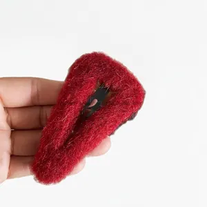 Cute red plush BB hair clip with geometric triangle design for autumn and winter styles