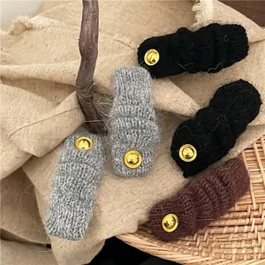 Fermagli per capelli in lana a maglia grigio nero marrone con dettaglio oro