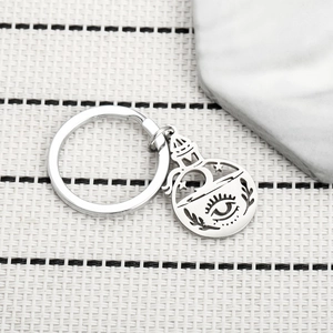Silver stainless steel magic potion keychain with hollow carved moon and star charms