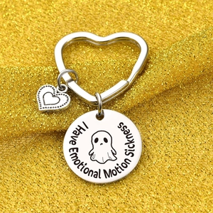 Silver stainless steel ghost keychain with I Have Emotional Motion Sickness engraving
