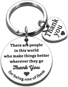 Detailed macro of stainless steel keychain with engraved heart and Thank You pendant