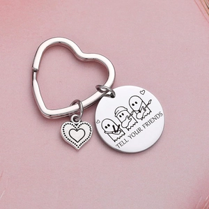 Stainless steel heart keychain with ghost musicians and Tell Your Friends engraving