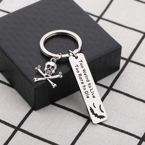 Gothic bat and skull stainless steel keychain with Too Weird to Live engraved pendant