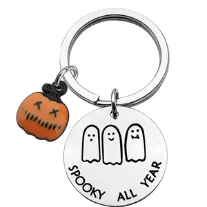 Stainless steel Halloween Spooky All Year keychain with orange pumpkin charm and ghost pendant
