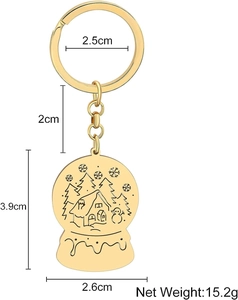 Detailed view of golden Christmas keychain with winter forest carving and dimensions