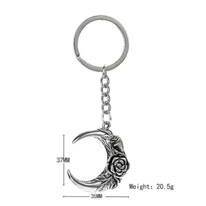 Retro moon and rose metal keychain with 37mm height and 20.5g weight measurements