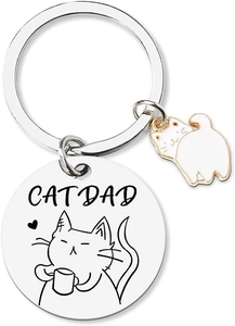 Detailed close-up of CAT DAD stainless steel keychain with white enamel cat charm