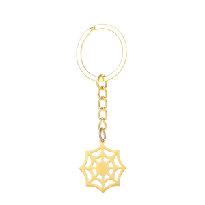 Detailed view of golden stainless steel spider web keychain pendant with hollow design