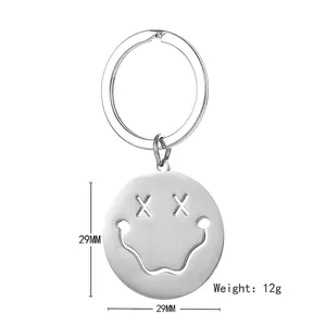 Minimalist stainless steel keychain with hollow smiley face pendant and 29mm diameter