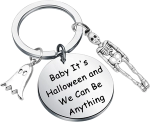 Detail of Halloween keychain with polished ghost, skeleton and engraved metal plate charms