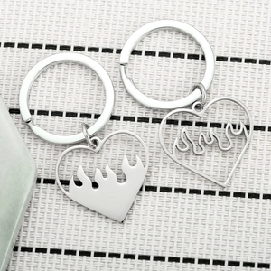 Polished stainless steel heart and flame keychains for couples in silver finish