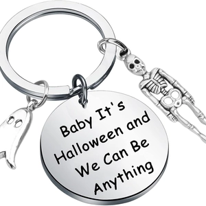Ghost and skull stainless steel keychain with engraved Halloween quote on white background