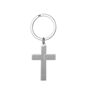 Detail view of silver stainless steel cross keychain with engraved Jesus text