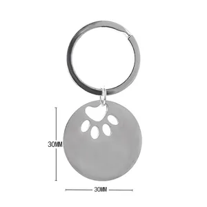 30mm Stainless steel round dog tag keychain with paw print cutout weighing 11.7g