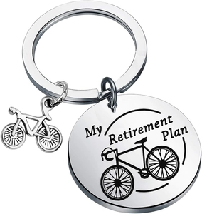 Macro shot of the stainless steel keychain with bicycle charm and My Retirement Plan engraving