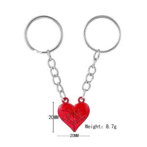 Magnetic heart couple keychain with red enamel finish and polished silver key ring set