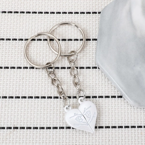 Silver metal heart pendant keychain set with abstract minimalist line art and white finish