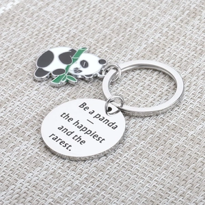 Detailed engraving showing 'Be a panda' quote on a polished stainless steel keychain charm