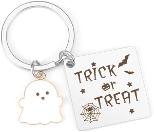 Macro detail of Trick or Treat ghost keychain with engraved stainless steel pendant