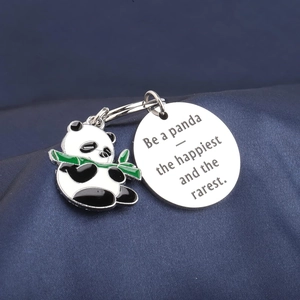 Panda enamel keychain with inspirational metal tag on premium blue silk background