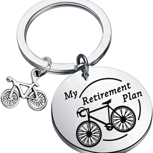 Polished stainless steel bicycle keychain with My Retirement Plan engraving on silver disc
