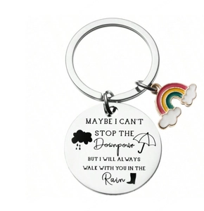 Polished steel keychain with enamel rainbow pendant and motivational engraving on silver disk
