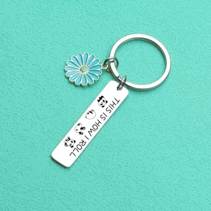 Panda and daisy stainless steel keychain featuring a This Is How I Roll engraved plate