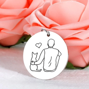 Polished stainless steel keychain featuring cat and person silhouette with heart detail