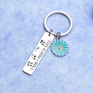 Cute panda and daisy stainless steel keychain featuring This Is How I Roll engraving