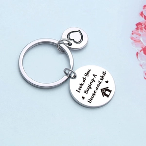 Polished stainless steel housewarming keychain with funny house and heart engraving