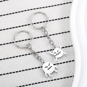 Set of two angry monster stainless steel keychains with silver polished metal finish