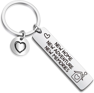 Polished stainless steel New Home New Adventure keychain with heart charm and engraving