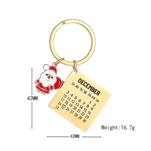 Porte-clés de Noël avec Père Noël et pendentif calendrier de décembre en métal doré