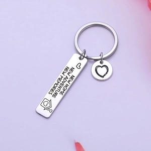 New home keychain with engraved New Adventure memories text on stainless steel ring