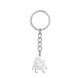 Polished silver metal keychain with angry character pendant on white background