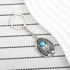 Vintage silver eagle keychain with turquoise gemstone in retro hip hop style for men