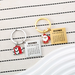 Porte-clés Calendrier de Noël en Acier Inoxydable Père Noël Coffret Cadeau Pendentif en Émail Date de Décembre Porte-clés Accessoire