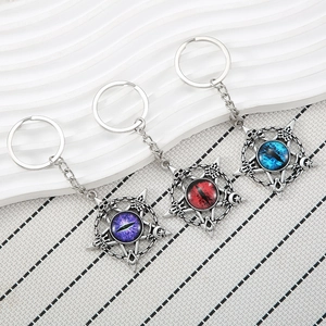 Portachiavi vintage malocchio con pentagramma stella e luna in viola rosso e blu